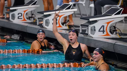 Jillian Cox celebrating after completing a race