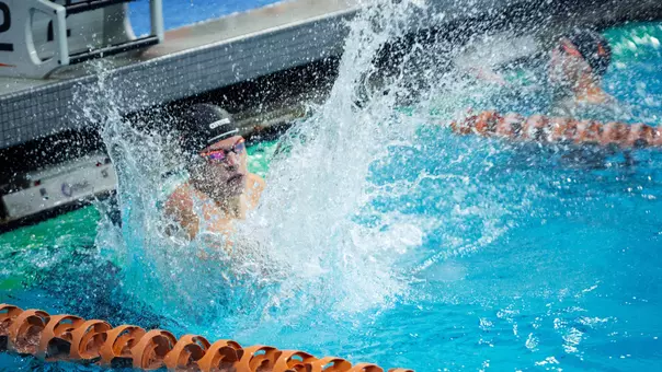 Modglin splashing water after winning an Event
