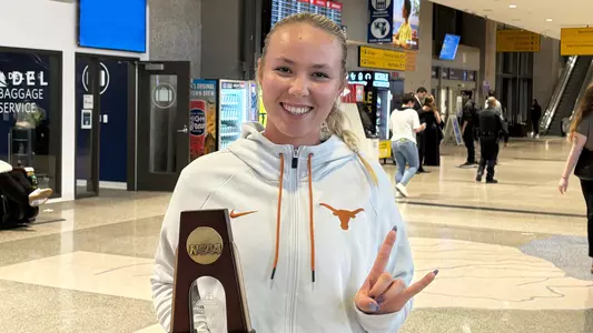 Carmen Herea NCAA quarters trophy 112125