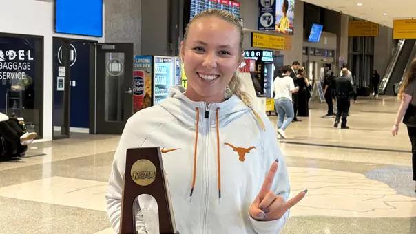 Carmen Herea NCAA quarters trophy 112125