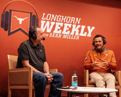 Coach Miller with Craig Way on set of Longhorn Weekly radio show