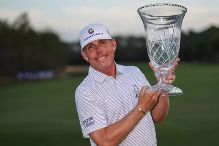 NAPLES, FLORIDA - FEBRUARY 16: Justin Leonard of the United States poses with the trophy after his win at the Chubb Classic 2025 at Tiburon Golf Club on February 16, 2025 in Naples, Florida. (Photo by Brennan Asplen/Getty Images)
