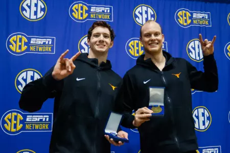 Chris Guiliano and Luke Hobson at podium following 200 free