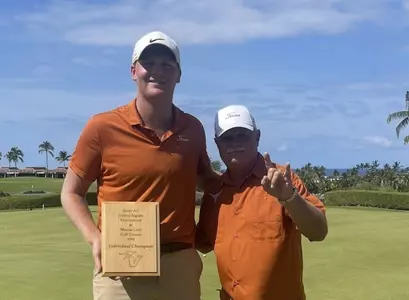 Tommy Morrison with Coach Fields - individual medalist at 2025 Amer Ari Invitational