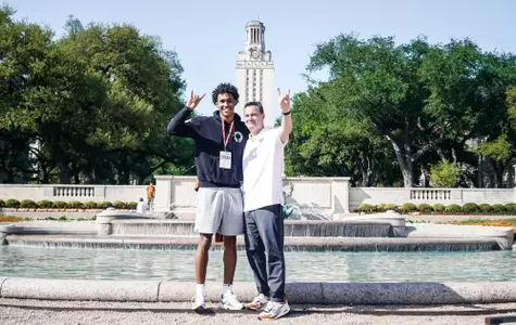 Dailyn Swain with Sean Miller in front of UT Tower