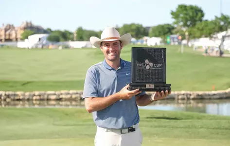 MCKINNEY, TEXAS - MAY 04: Scottie Scheffler of the United States celebrates with the trophy after winning THE CJ CUP Byron Nelson 2025 at TPC Craig Ranch on May 04, 2025 in McKinney, Texas. (Photo by Stacy Revere/Getty Images)