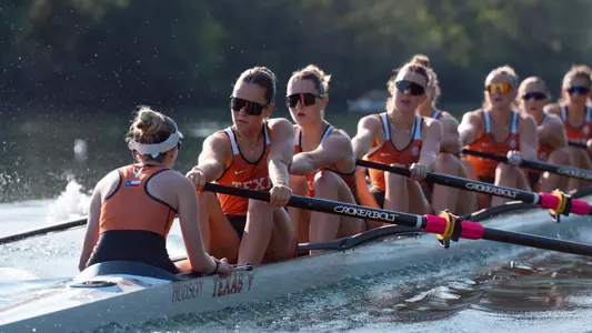 Sue Holderness (front) at the Texas First Varsity Eight compete vs. Michigan on April 12.