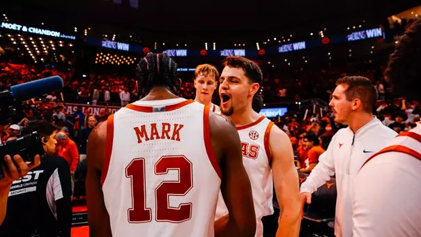 Tramon Mark celebrates with Camden Heide after Vanderbilt win