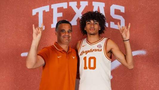 Austin Goosby with Sean Miller on official visit - posed