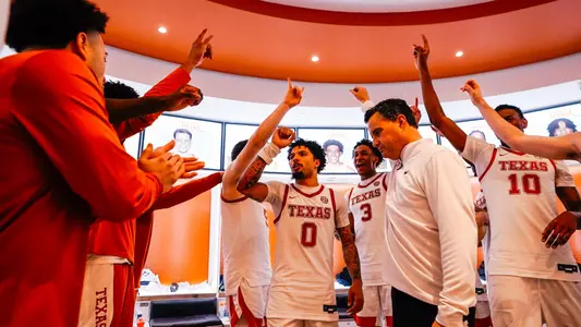locker room team huddle after Vanderbilt win