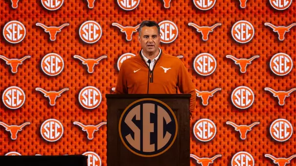 Coach Miller at podium during 2026 SEC Media Day