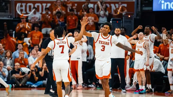 Sim Wilcher and Dailyn Swain high-five