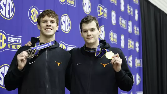 Kos and Modglin at the SEC Podium