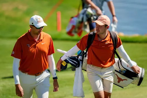 Eduardo Derbez Torres walks with Assistant Coach Clayton Brady