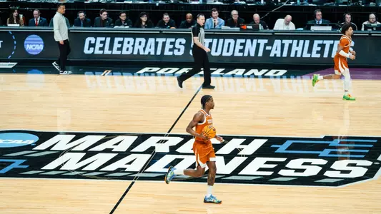 T Mark dribble mid-court