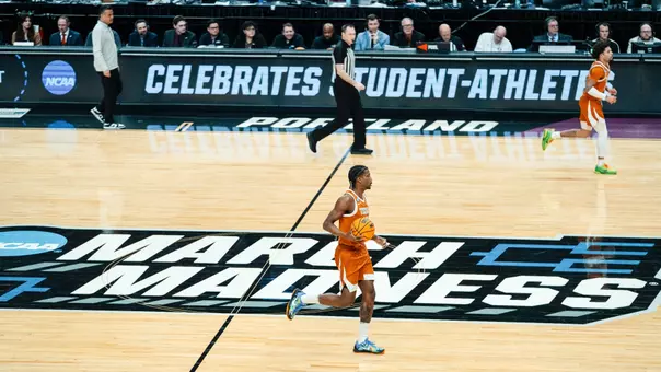 T Mark dribble mid-court