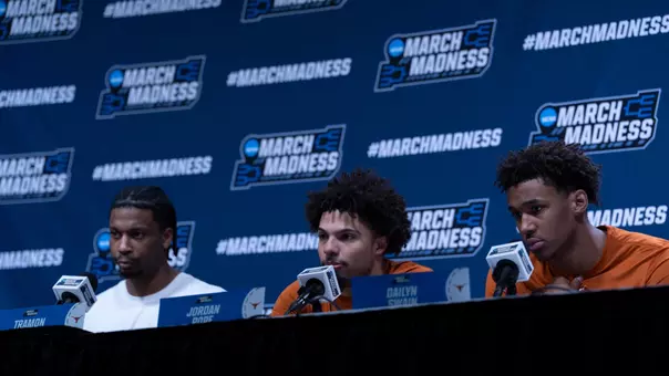 Tramon Mark, Jordan Pope and Dailyn Swain on the podium for the pre-NCAA Second Round presser