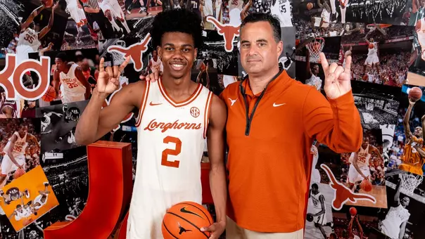 Coach Miller with Isaiah Johnson on recruiting visit - posed