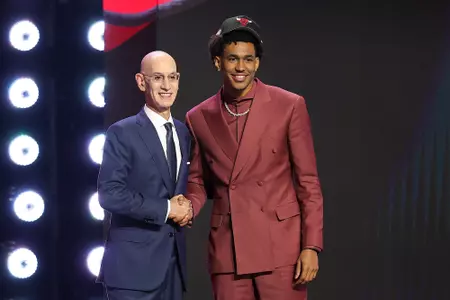 NEW YORK, NEW YORK - JUNE 23: NBA commissioner Adam Silver shakes hands with Dailyn Swain after he is drafted fifteenth overall by the Chicago Bulls during Round One of the 2026 NBA Draft at Barclays Center on June 23, 2026 in New York City. (Photo by Arturo Holmes/Getty Images)
