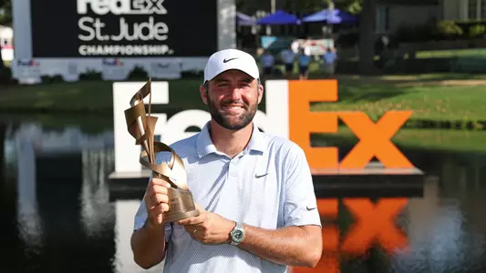 MEMPHIS, TENNESSEE - AUGUST 16: Scottie Scheffler of the United States celebrates with the trophy after winning during the final round of the FedEx St. Jude Championship 2026 at TPC Southwind on August 16, 2026 in Memphis, Tennessee. (Photo by Stacy Revere/Getty Images)