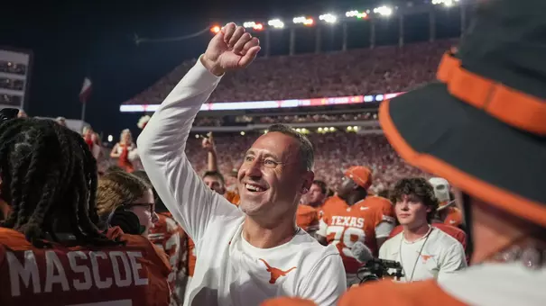 Steve Sarkisian celebrates after beating No. 1/1 Ohio State