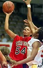 Lady Raider Plenette Pierson puts up a shot during Tech's 66-63 overtime victory over USC Monday night in Los Angeles.