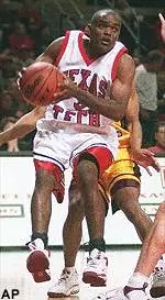 Texas Tech's Rayford Young tries to go inside against Southwest Texas' Jason Blair in the first half in Lubbock, Texas Tuesday.