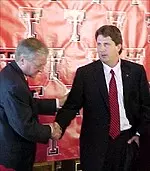 Texas Tech Chancellor John Montford introduces new head football coach Mike Leach, Thursday.