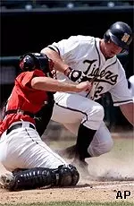 Texas Tech catcher Josh Bard<br>is late tagging Missouri runner<br>Aaron Wilson during Red<br>Raiders' 8-7 loss, Thursday.