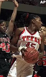 Angie Braziel fights through<BR>two Rutgers' defenders<BR>during Saturday's game.