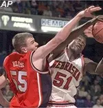 Andy Ellis, left, reaches <br>for a loose ball <br>during Thursday's loss<br> to Nebraska.