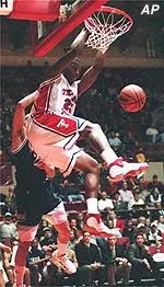 Johnny Phillips nets two of<BR>his 14 points against Nevada.