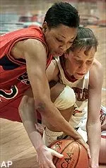 Lady Raider Katrisa O'Neal fights with Cyclone Stacy Frese for the ball in the second half of a 62-37 Tech loss Sunday.