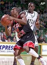 Texas Tech's Mario Layne drives past Baylor forward Terry Black in first-half action Wednesday night.