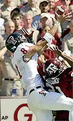 WR Tim Baker leads the Red Raiders with 56 catches and 640 yards.