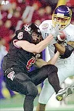 Paul McClendon battles for a ball in the first half of the galleryfurniture.com Bowl game Wednesday night.