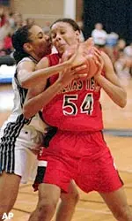 Rice's Daneesh McIntosh (30) pressures Texas Tech's Plenette Pierson (54) during the first half.