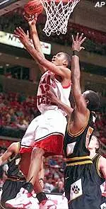 Ronald Hobbs scores over Missouri's Keyon Dooling in the first half of Tuesday's game.