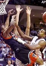 Mario Layne loses control of the ball while being pressured by two Texas A&M defenders in the 76-64 Tech win Saturday.