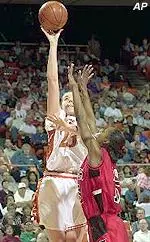 Aleah Johnson put pressure on Longhorn Tracy Cook in the first half of the 91-85 double-overtime Lady Raider win Wednesday.