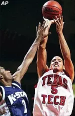 Texas Tech's James Ware shoots over Kansas State's Cortez Groves.
