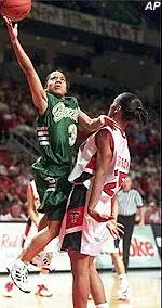 Texas Tech's Keitha Dickerson tries to draw a charge from Baylor guard Nicole Collins.