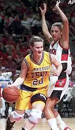 Tennessee Tech guard Rachael Gobble runs the baseline against Texas Tech's Amber Tarr during the Lady Raiders' 83-54 victory, Saturday.
