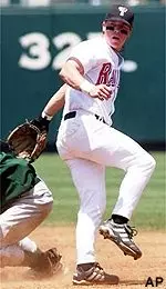 Shaun Larkin makes a tag at second base during the 10-1 Red Raider loss to Baylor Saturday at the Big 12 Tournament.