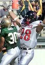 Texas Tech free safety Ryan Aycock celebrates his interception and return for a touchdown against Baylor in the second quarter.