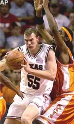 Texas Tech's Andy Ellis (55) pushes against Sam Houston State's Donald Cole during the game Saturday night.