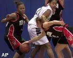 Texas Tech guard Amber Tarr gathers in a loose ball knocked away by teammate Casey Jackson from St. Peter's forward Felicia Harris in the first half Wednesday.