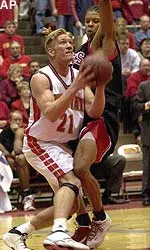 Texas Tech's Andre Emmett, left, guards Iowa State's Shane Power during the first half.