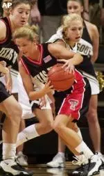 Candi White and the Lady Raiders battle the Bulldogs of Mississippi State on Sunday.