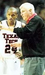 Junior Ronald Ross and Coach Knight on the sidelines.